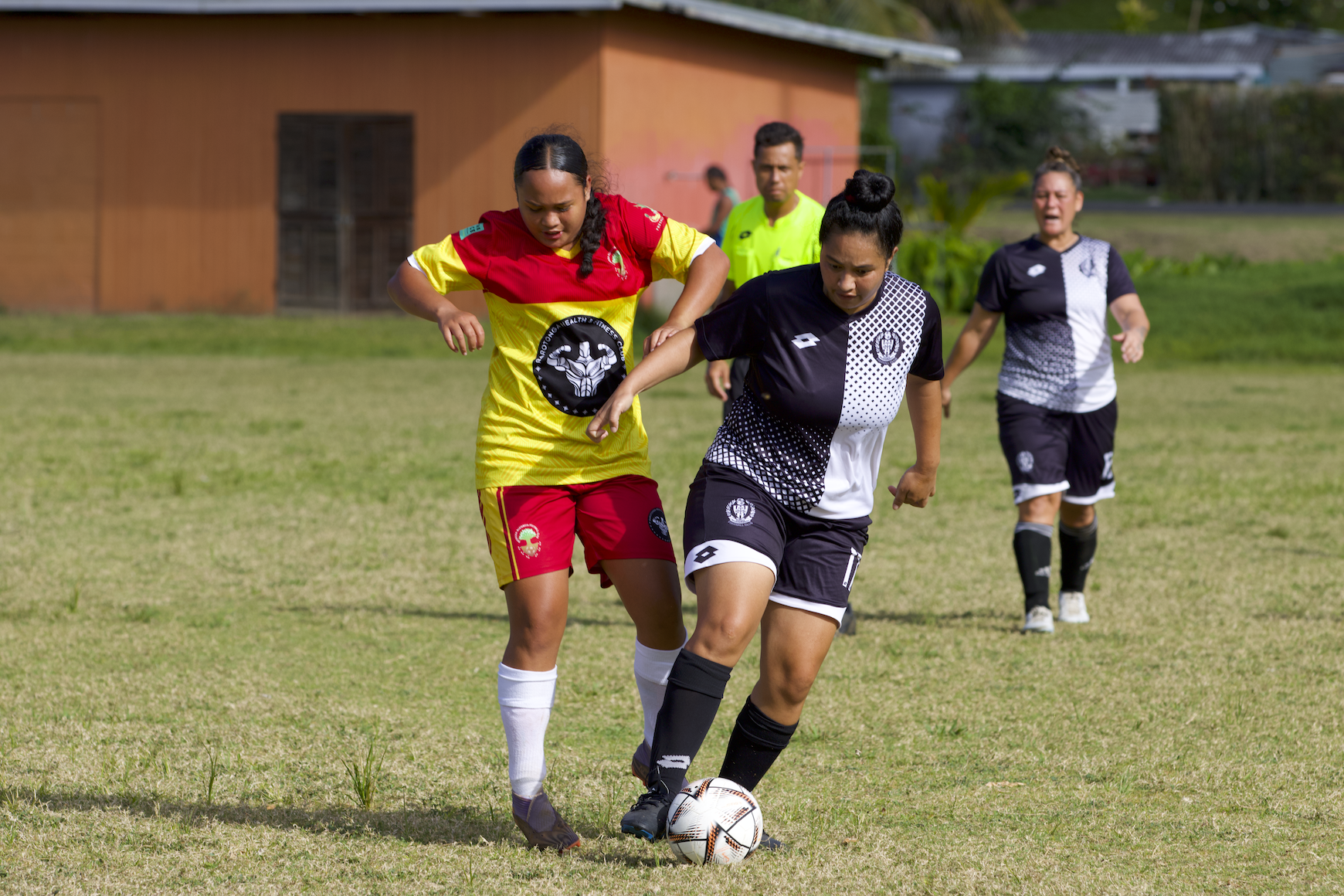 Neighbours clash in football derby