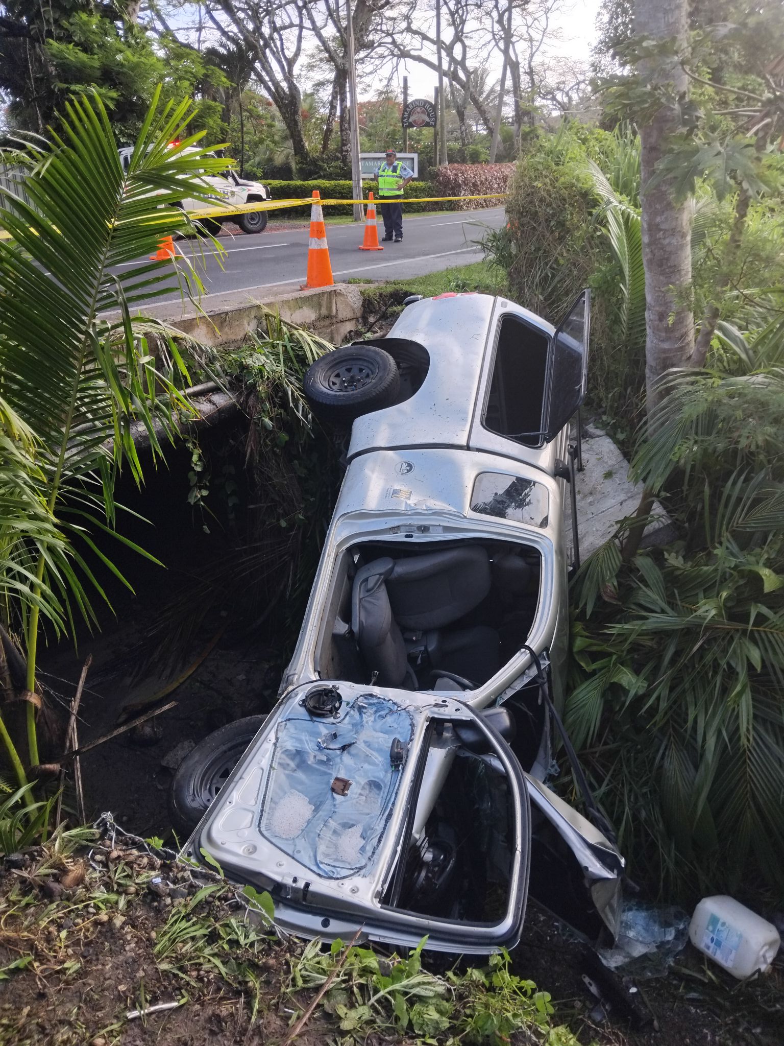 Bystanders aid driver after truck plunges into stream