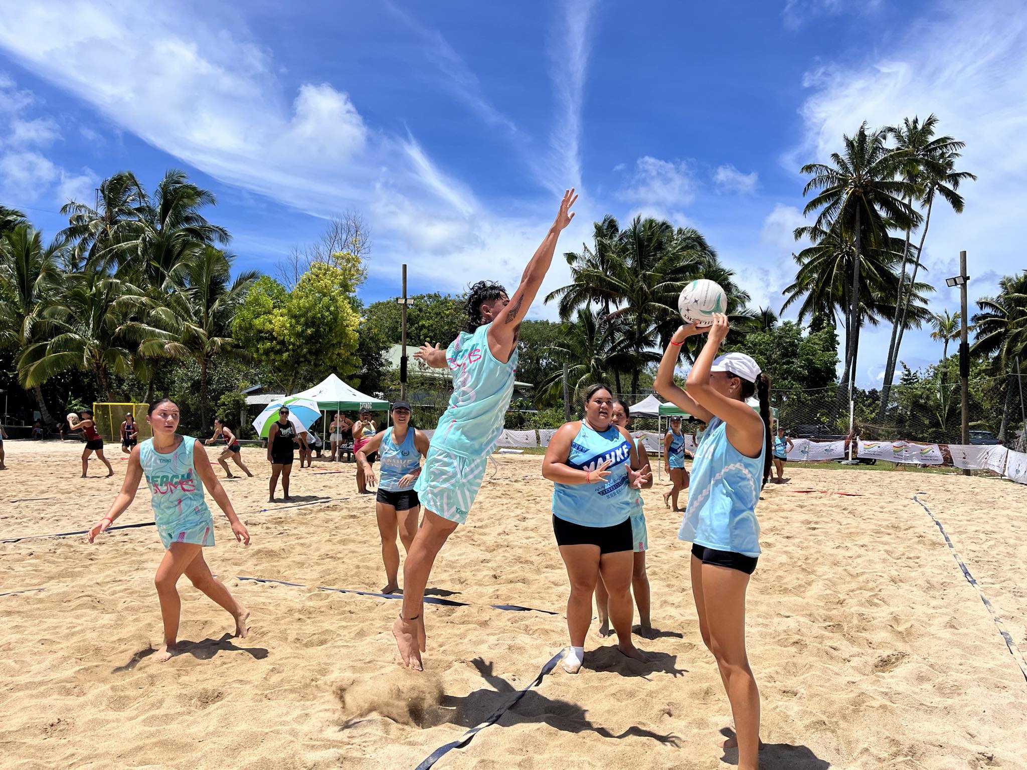 Athletes enjoy timeout in the sand despite adverse weather